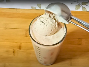 Step-by-Step Guide to Making a Chocolate Coffee Milkshake - Step 3 Blend In The Vanilla Ice Cream