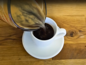 Steps To Brew The Perfect Cuban Coffee - Vigorously mix the coffee and sugar until it forms a thick, creamy paste (known as espuma). Once the rest of the coffee has brewed, pour it over the espuma, stir well, and serve in espresso cups.