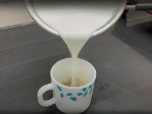 Step-by-step Recipe To Make Jaggery Coffee - Step 3 Heat The Milk